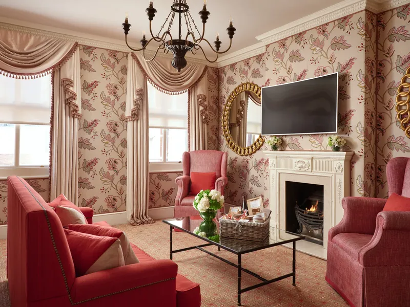 The Milestone Residences, Kensington: The Milestone Residences: Victoria & Albert residence lounge with patterned curtains, photo 1
